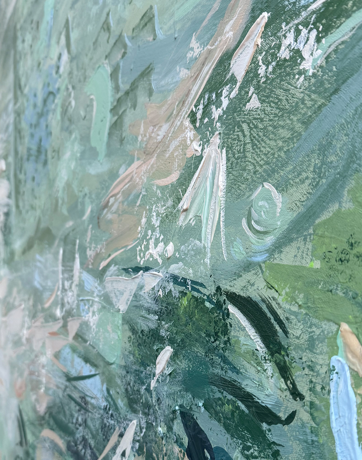 Detail of thick green and cream impasto brushstrokes on canvas
